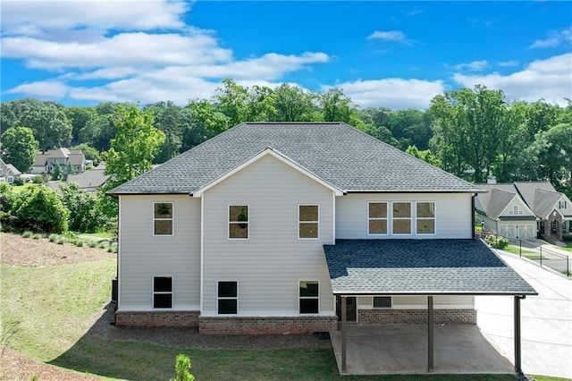 1226 Bloomsbury Ln, Gainesville, GA 30501 - back of property featuring a patio and roof with shingles