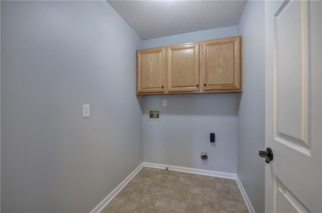 11 Trotters Walk NE, Cartersville, GA 30121 - washroom featuring hookup for a washing machine, cabinet space, baseboards, electric dryer hookup, and a textured ceiling