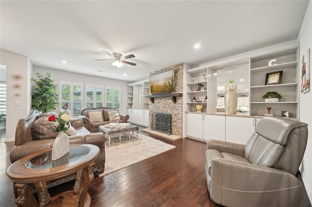 130 W Pier Way, Fayetteville, GA 30214 - living area featuring dark wood-type flooring, a stone fireplace, a ceiling fan, recessed lighting, and built in features
