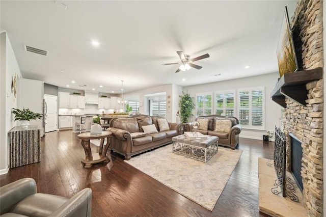 130 W Pier Way, Fayetteville, GA 30214 - living room with a stone fireplace, a ceiling fan, recessed lighting, dark wood-type flooring, and baseboards