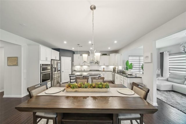 130 W Pier Way, Fayetteville, GA 30214 - dining space with dark wood-style floors, baseboards, a chandelier, and recessed lighting
