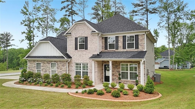 130 W Pier Way, Fayetteville, GA 30214 - craftsman-style home with stone siding, a front lawn, board and batten siding, and a shingled roof