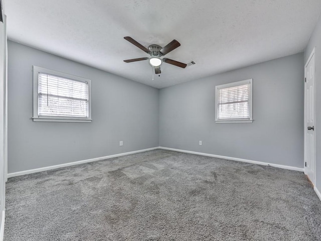 525 Henson Cir, Carrollton, GA 30117 - carpeted spare room featuring a ceiling fan and baseboards