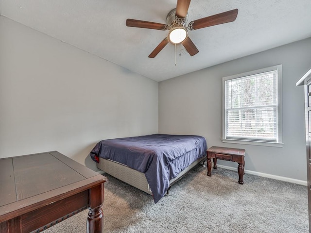 525 Henson Cir, Carrollton, GA 30117 - bedroom with baseboards, carpet flooring, and a ceiling fan