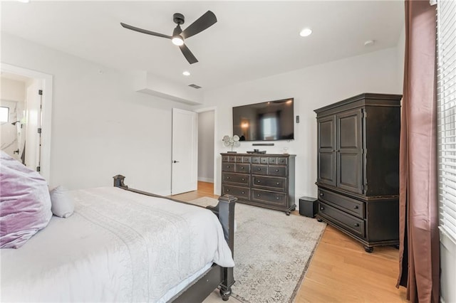 bedroom featuring ceiling fan and light wood-type flooring