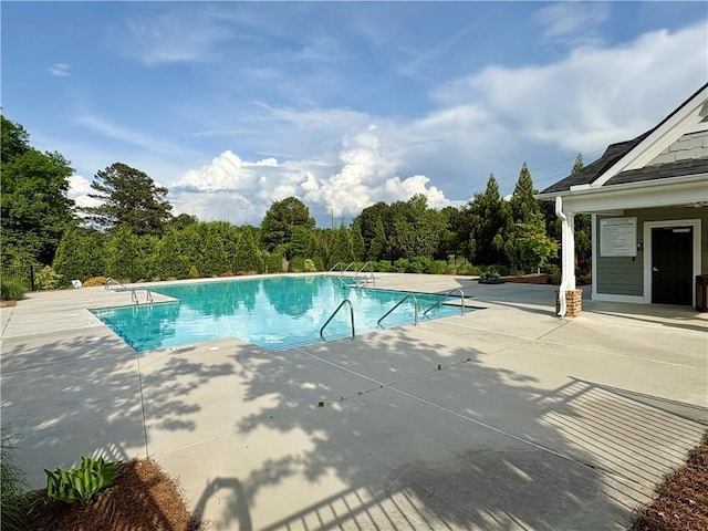 pool with a patio