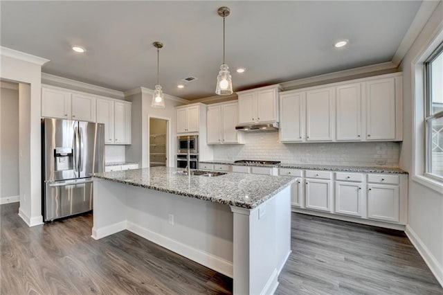 kitchen with white cabinetry, a kitchen island with sink, and stainless steel appliances