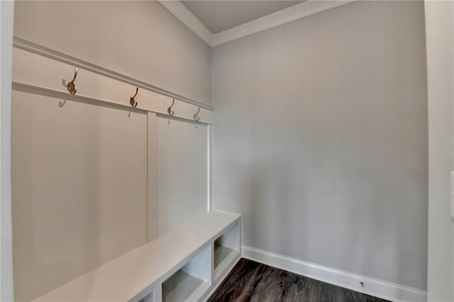 mudroom with dark wood-type flooring and ornamental molding