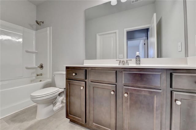 full bathroom featuring vanity, shower / tub combination, and toilet