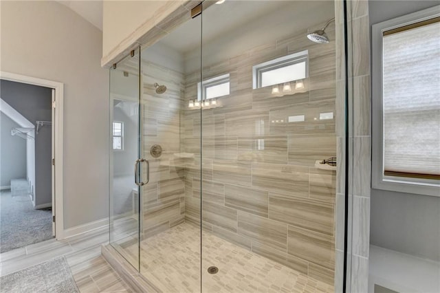 bathroom with an enclosed shower