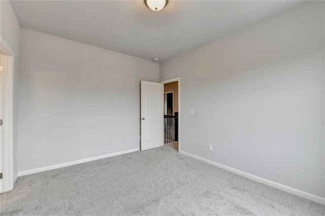 spare room featuring carpet floors