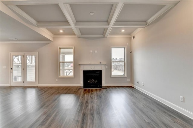 unfurnished living room featuring coffered ceiling, crown molding, dark hardwood / wood-style floors, and beamed ceiling