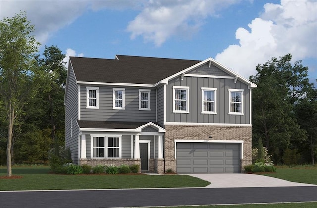 view of front of home with a garage and a front lawn