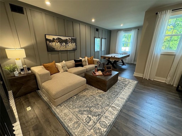 living room featuring dark hardwood / wood-style floors