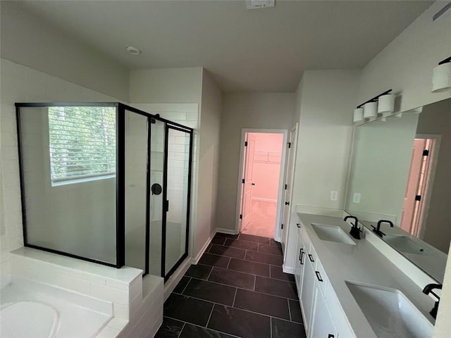 bathroom with tile patterned flooring, vanity, and separate shower and tub