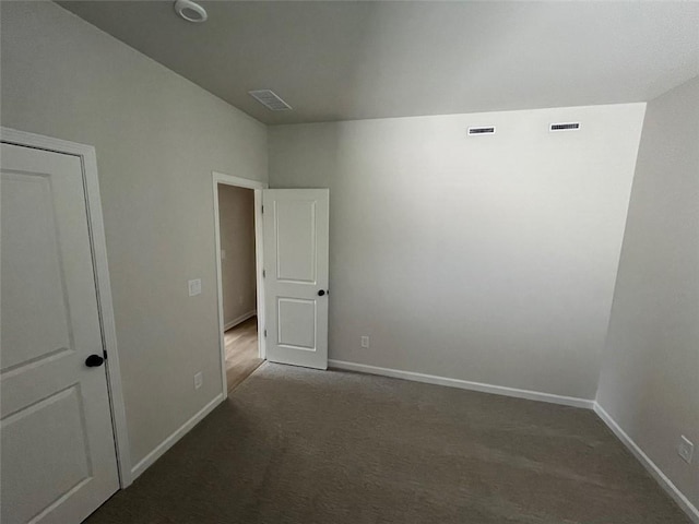 unfurnished room with carpet floors