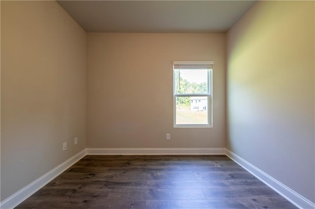 unfurnished room featuring hardwood / wood-style flooring