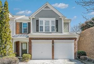 traditional home with a garage and driveway