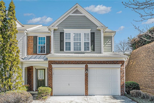 traditional home featuring brick siding, concrete driveway, and a garage