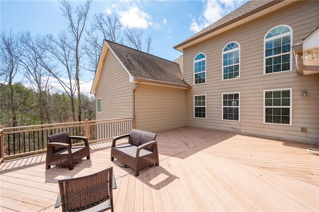 1227 Castle Point Ct SW, Conyers, GA 30094 - wooden terrace featuring an outdoor hangout area