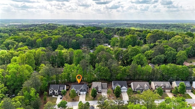 aerial view with a forest view and a residential view