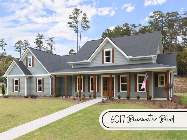 view of front facade featuring a porch and a front yard