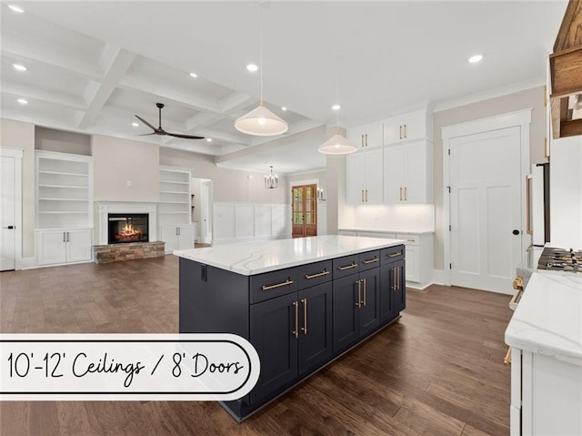 kitchen featuring white cabinetry, coffered ceiling, dark wood-type flooring, and a kitchen island