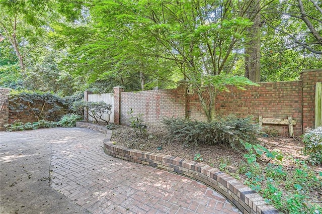 12 Westchester Sq, Decatur, GA 30030 - fenced backyard with a patio area