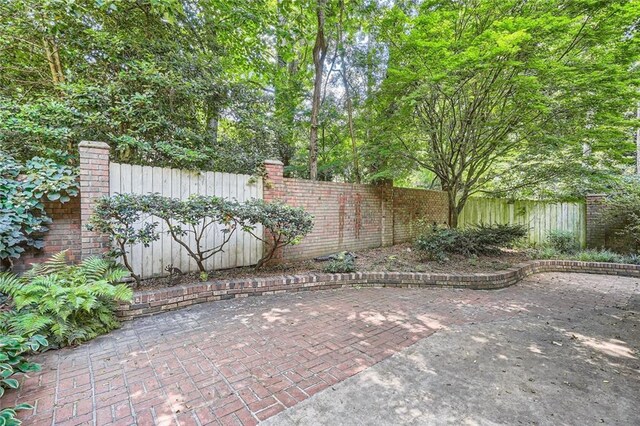 12 Westchester Sq, Decatur, GA 30030 - fenced backyard with a patio area