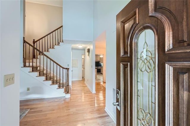 12 Westchester Sq, Decatur, GA 30030 - entrance foyer featuring a towering ceiling, light wood finished floors, and stairway