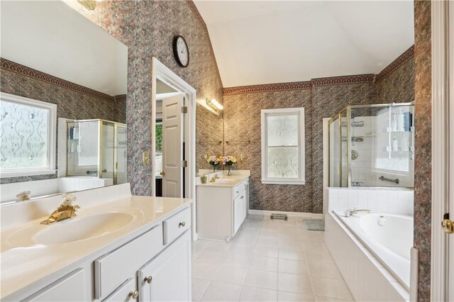 bathroom featuring a shower stall, tile patterned flooring, a sink, and wallpapered walls