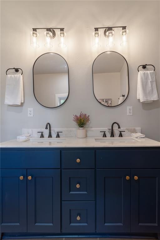 235 Lowry St, Ball Ground, GA 30107 - bathroom with double vanity