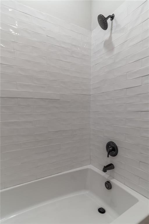 235 Lowry St, Ball Ground, GA 30107 - full bath featuring shower / tub combination