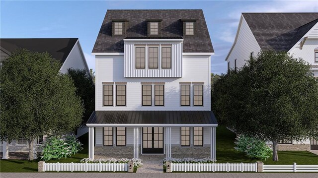 view of front of home featuring covered porch and a fenced front yard