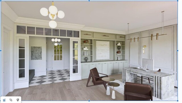 dining space featuring light wood finished floors and a notable chandelier