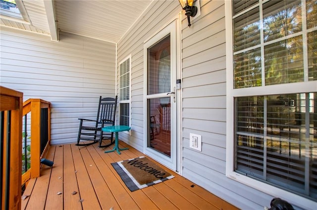 wooden deck featuring covered porch