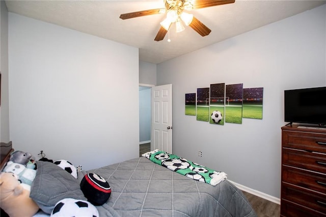 bedroom featuring wood-type flooring and ceiling fan