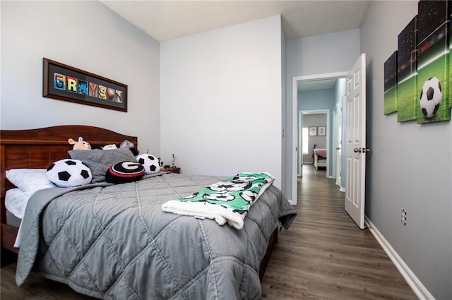 bedroom featuring hardwood / wood-style floors