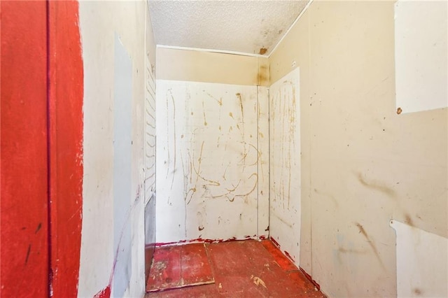 bathroom with a textured ceiling