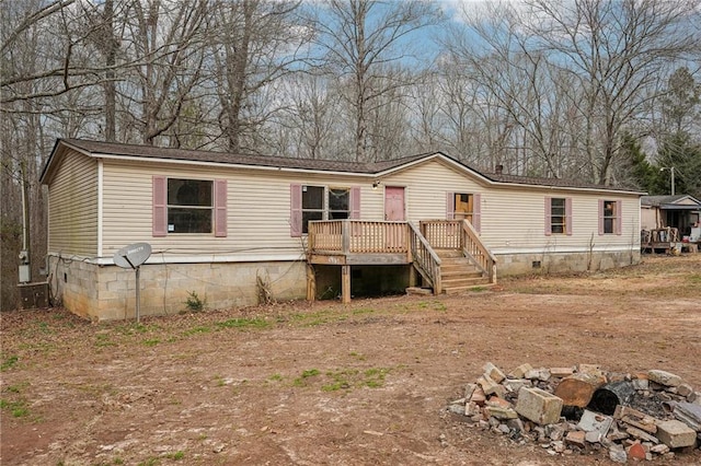 manufactured / mobile home featuring a deck