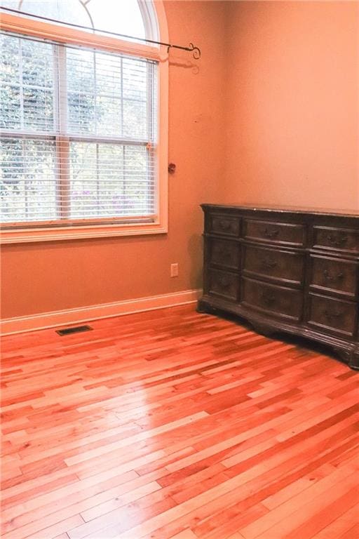 empty room featuring hardwood / wood-style floors