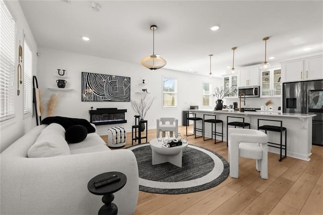 living room with light wood-type flooring