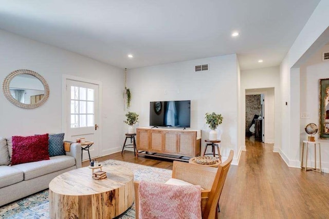 living room with light wood-type flooring