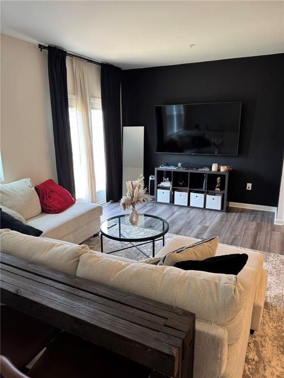 536 Magnolia Cir Unit 116, Palmetto, GA 30268 - living room with wood finished floors