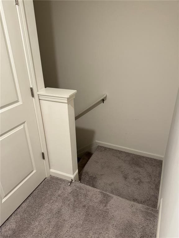 536 Magnolia Cir Unit 116, Palmetto, GA 30268 - staircase featuring carpet and baseboards