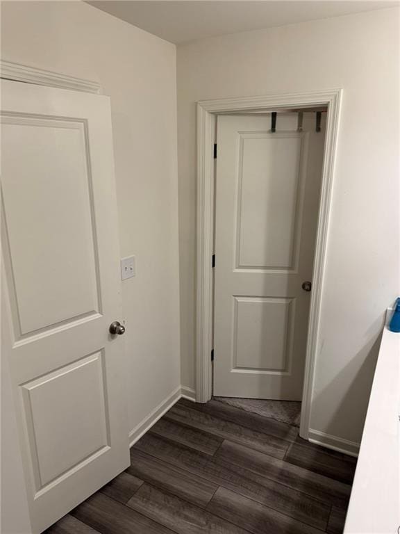 536 Magnolia Cir Unit 116, Palmetto, GA 30268 - corridor featuring dark wood-type flooring and baseboards
