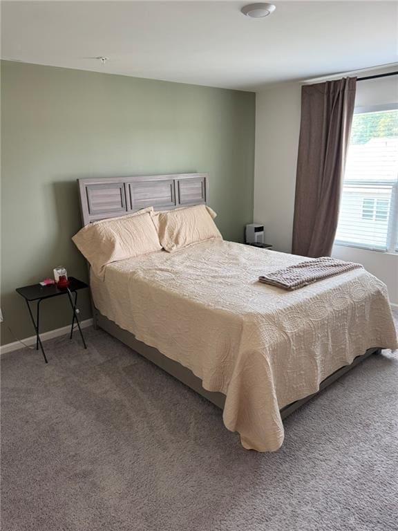 536 Magnolia Cir Unit 116, Palmetto, GA 30268 - bedroom featuring carpet and baseboards
