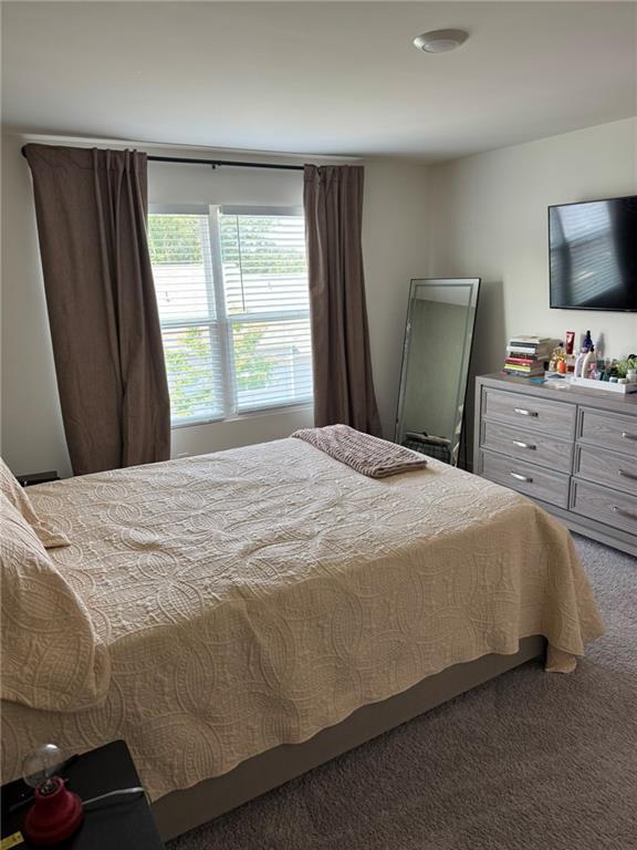 536 Magnolia Cir Unit 116, Palmetto, GA 30268 - bedroom with carpet flooring