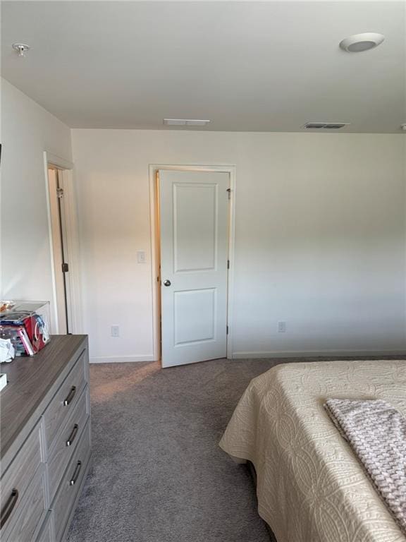536 Magnolia Cir Unit 116, Palmetto, GA 30268 - carpeted bedroom featuring baseboards