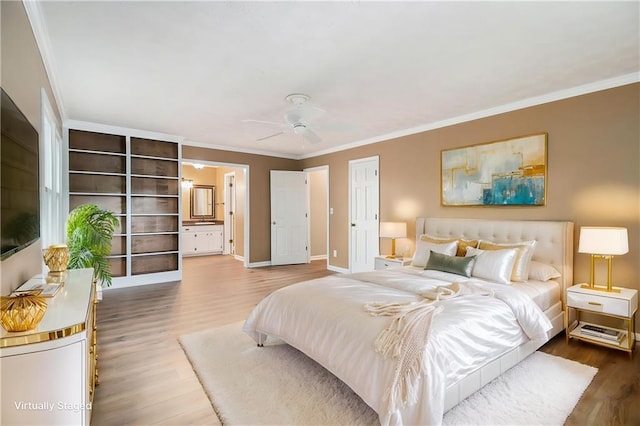 bedroom featuring ornamental molding, wood finished floors, baseboards, and ceiling fan